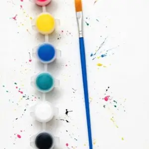 6 mini acrylic paint pots strip pink yellow blue teal white black with blue handle brush and kids creative zone card